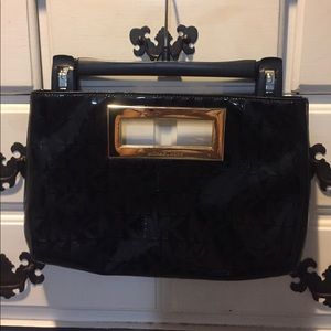 Michael Kors black clutch with gold handle